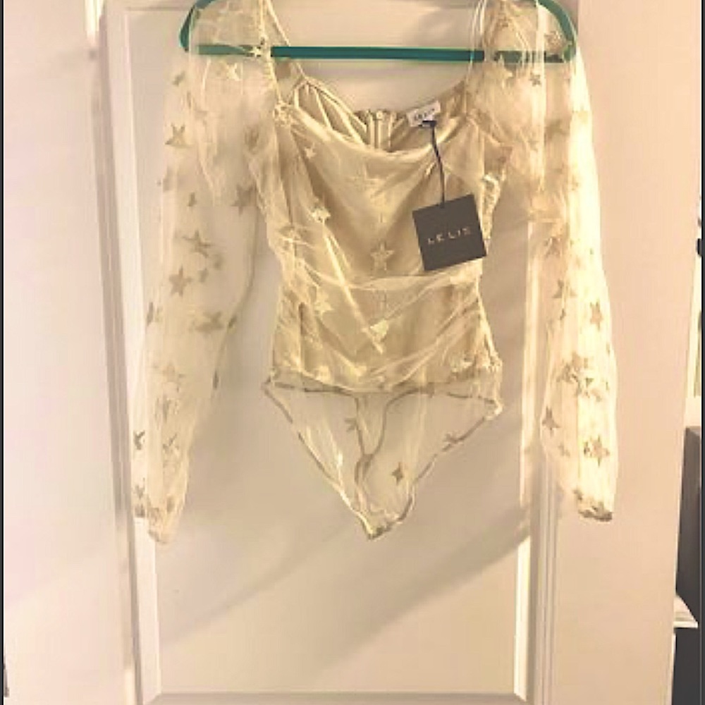 CUTESY BODY SUIT EVER. PERFECT FOR GIRLS NIGHT